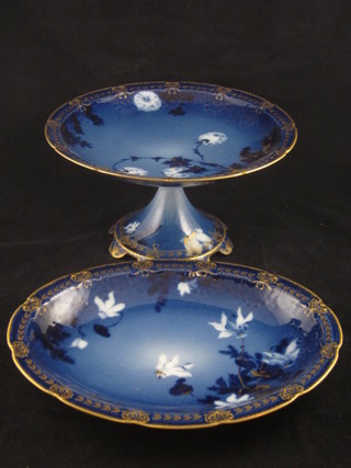 A 14 piece French Haviland flo bleu pattern dessert service comprising pair of 9" comports, a 9" circular dish, a 9" oval  dish and 10 8 1/2" circular plates - 2 with chips to rim