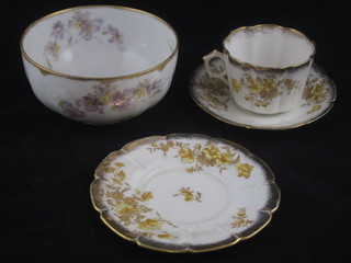 A 20 piece Limoges Haviland tea service comprising a pair of rectangular plates 9 1/2", 6 plates 8 1/2" - 1 cracked and 2  chipped, sugar bowl, 3 cups - all chipped, 4 tea plates 6" and 4  saucers - 2 cracked