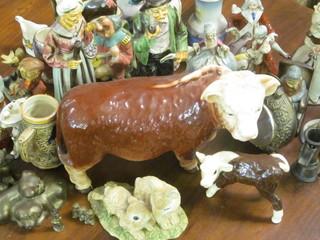 A Melba pottery figure of a standing Hereford Bull 10" and a collection of pottery figures etc
