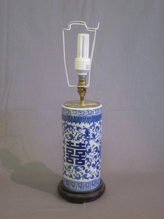 An Oriental blue and white porcelain vase converted to a table lamp 12"