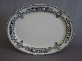 A 19th Century black glazed meat plate 16"