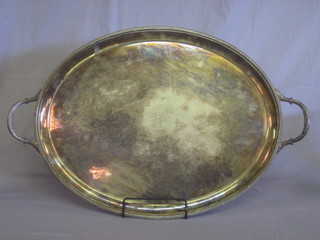 An oval silver plated twin handled tea tray 22"