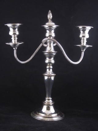 A pair of silver plated 3 light candelabrum with bead work  borders