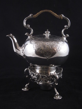 A Victorian silver plated tea kettle and stand complete with burner