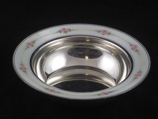 A circular Sterling silver and enamelled dish, base marked 2010, 6"
