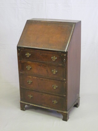 A Georgian style mahogany bureau with fall front revealing a well fitted interior above 4 long graduated drawers, raised on  bracket feet, some old worm to top, 23"