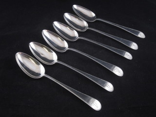 6 19th Century Continental silver table spoons with bright cut decoration 11 ozs