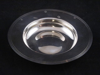 A circular silver Armada dish with millennium hallmark, 3 ozs