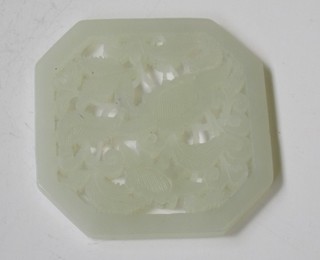 An octagonal pierced section of jade 2"