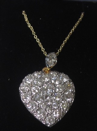 An 18ct gold heart shaped pendant set diamonds, approx 2.0ct
