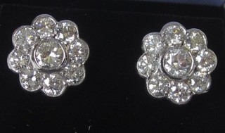A pair of ladies 18ct gold diamond cluster earrings approx 2.55ct
