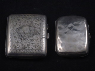 An engraved silver cigarette case, Birmingham 1930, 2 ozs and a  plain silver cigarette case Birmingham 1929