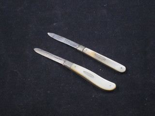 2 silver bladed folding fruit knives with mother of pearl grips