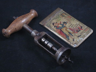 A 19th Century metal corkscrew together with a Chaussures Incroyable aide memoir