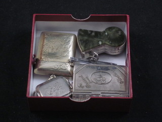 A chrome vesta case in the form of a thistle, a silver plated vesta case in the form of a book and 1 other small vesta case