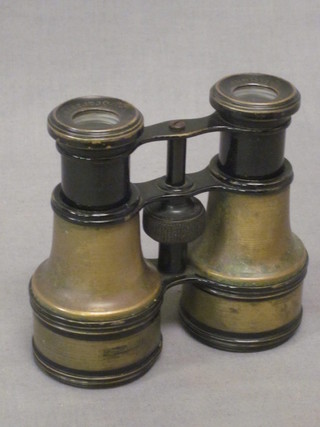 A pair of opera glasses by Smith & Sons in gilt metal case