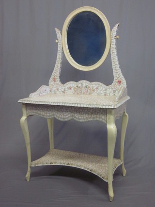 A rectangular dressing table with mirror above a three-quarter gallery, the base fitted a drawer with undertier, raised on cabriole  supports, the top decorated with mosaic sections of china, 32"