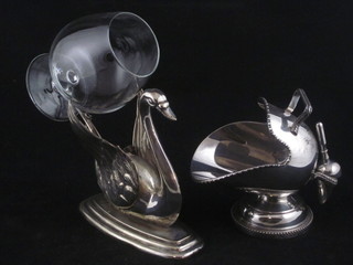 A silver plated brandy warmer in the form of a swan and a silver plated sugar scuttle