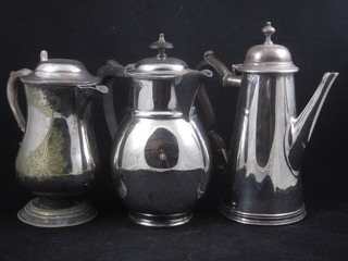 A silver plated Queen Anne style coffee pot and 2 hotwater jugs