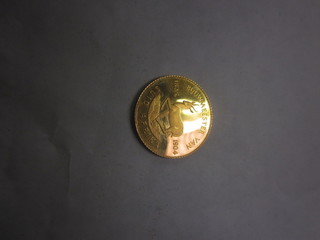 A Punjab mint 9ct gold Kruger commemorative coin