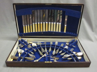 A canteen of silver plated flatware, contained in a mahogany canteen box
