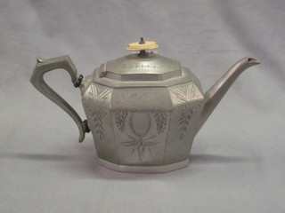 A Britannia metal teapot