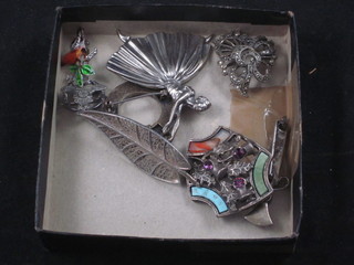 A "silver" brooch in the form of a Ballerina, a silver brooch in  the form of a dagger set hardstones, a silver filigree brooch, a  silver Royal Artillery Sweetheart brooch, a marcasite brooch, 2  hardstone brooches and a brooch in the form of a robin