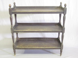 A Victorian rectangular mahogany 3 tier buffet, raised on turned  and block supports 40"