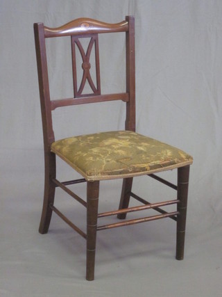 An Edwardian inlaid mahogany bar back bedroom chair with upholstered seat, raised on turned supports