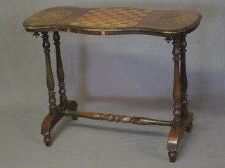 A Victorian shaped rosewood stretcher table, the top inlaid a chessboard, raised on turned supports with H framed stretcher  34"