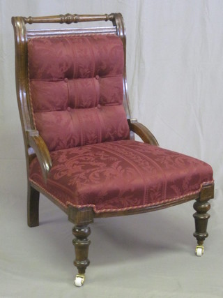 An Edwardian oak show frame chair upholstered in red material