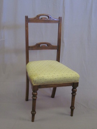 A set of 4 Edwardian mahogany bar back dining chairs with  upholstered seats