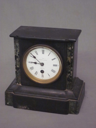 A 19th Century French 8 day mantel clock with enamelled dial  and Roman numerals contained in a black architectural case, the  dial marked TRE Dover Street