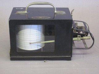A thermograph by Negretti and Zambra contained in a metal case