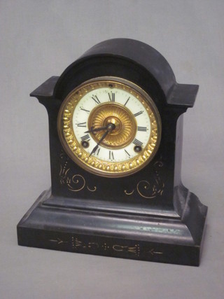 A 19th Century American 8 day mantel clock with enamelled dial  and Roman numerals, contained in an iron arch shaped case
