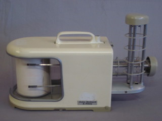 A barograph by Jules Richard & Pekly, contained in a plastic case