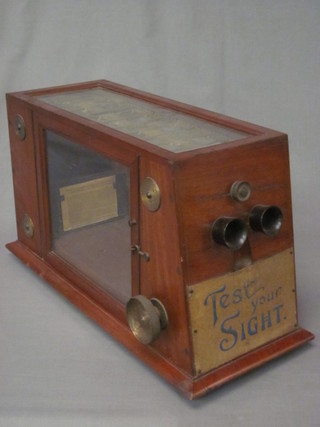 A Victorian Test Your Sight machine, contained in a mahogany  case 17"
