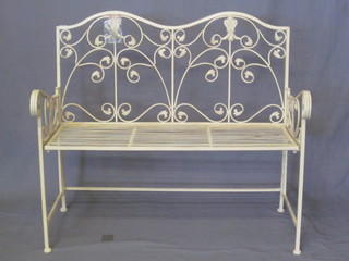 A white painted iron folding garden bench 41"