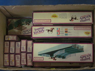 A quantity of various Triang Jump Jockey steeplechase track and figures, boxed