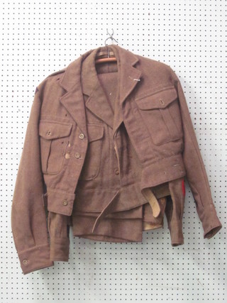 A Royal Engineers Corporal 1950's battle dress blouse and trousers - Bomb Disposal, some moth, and a 1952 Royal  Artillery battle dress blouse