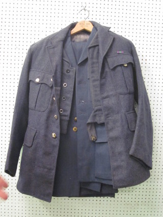 A RAF Pilot Officer's tunic and trousers, do. battle dress and an Airman's service dress tunic and trousers