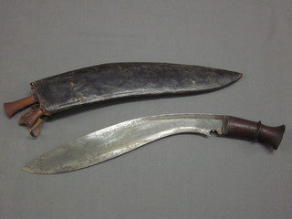 A Kukri with 30" blade complete with leather scabbard and 2  skinning knives
