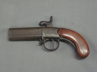 A 19th Century percussion pocket pistol with revolving double barrel 3"