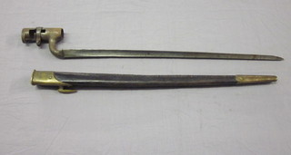 An 18th Century socket bayonet with 16 1/2" blade, complete  with scabbard