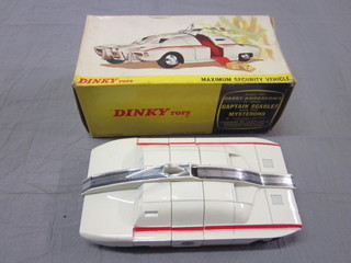 A Dinky no. 105 maximum security vehicle, boxed together with  a Dinky leaflet