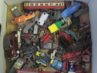 A collection of various toy cars, all play worn