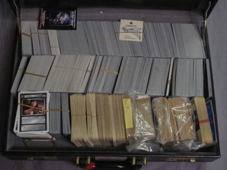 An attache case containing a collection Star Wars and other cards