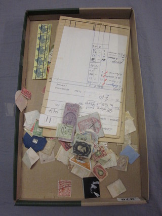 A quantity of loose stamps and a Crawley & District Society  stamp album