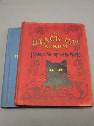 A Black Cat stamp album and a Universal stamp album