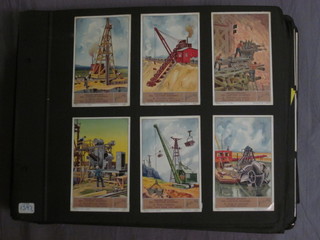 A large collection of various Liebig trade cards